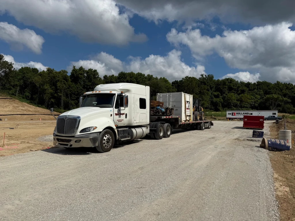 heavy equipment transport truck with load St Louis, MO